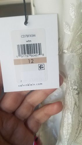 Hand sewn sequins, never worn