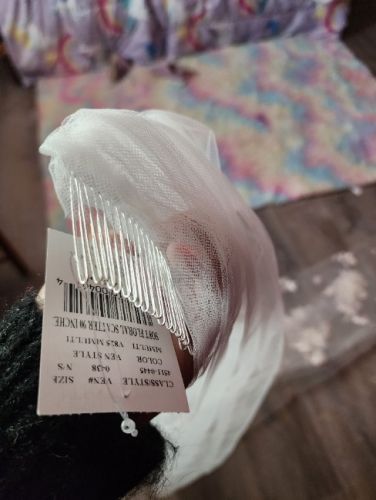 Never worn wedding dress with veil