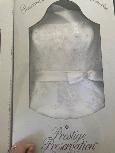 In professionally preserved box.  