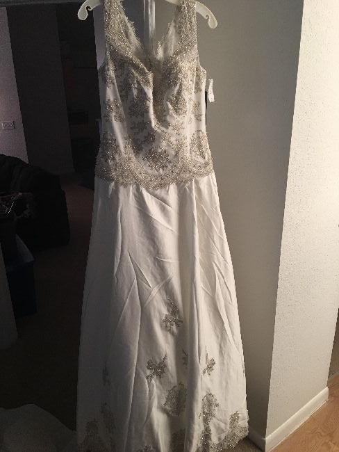 Never worn lace wedding gown