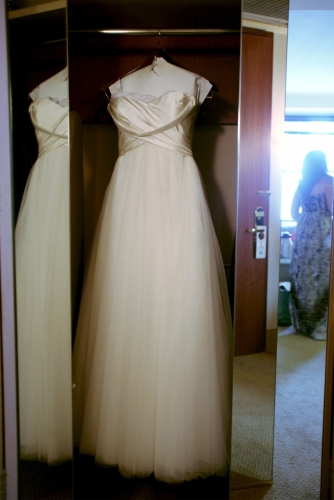 dress on hangar with strap hanging down